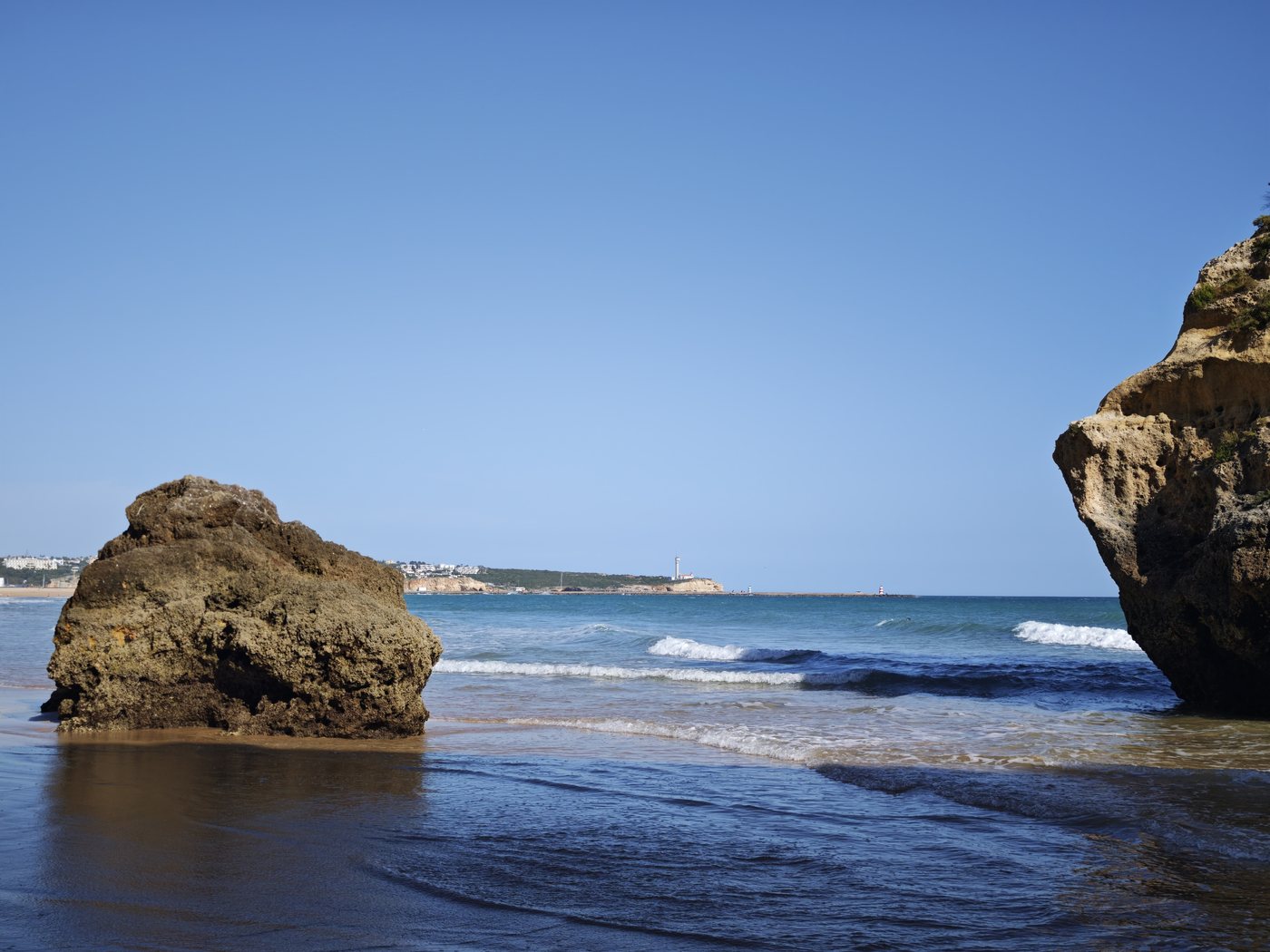 Golden rock formations at an Algarve beach