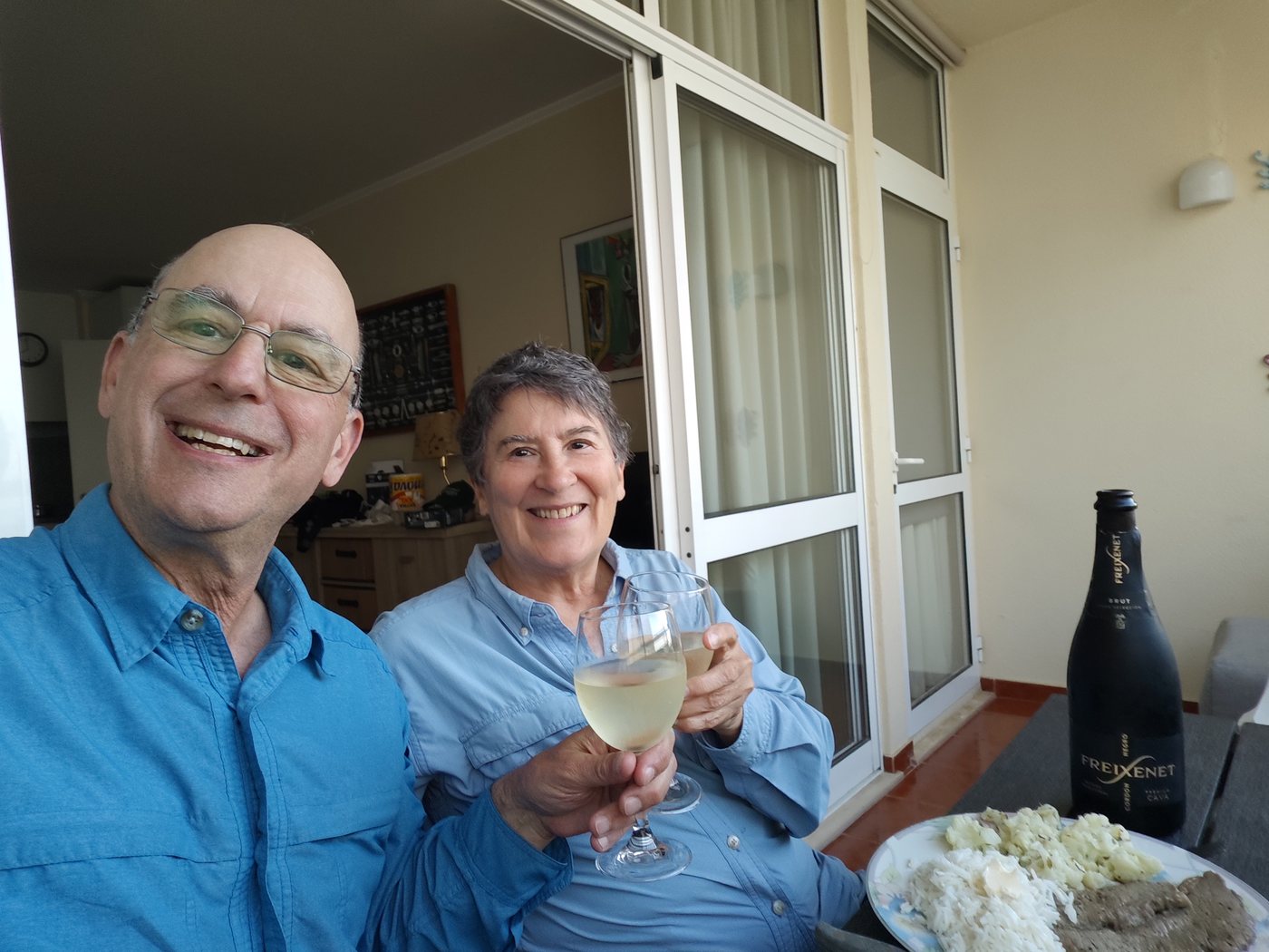 Ben and Kathy celebrating with Freixenet on the balcony