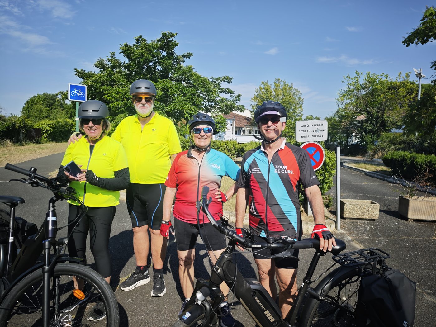 Ben, Kathy, Deb, and Randy with their eBikes at the start of the ride in Latresne