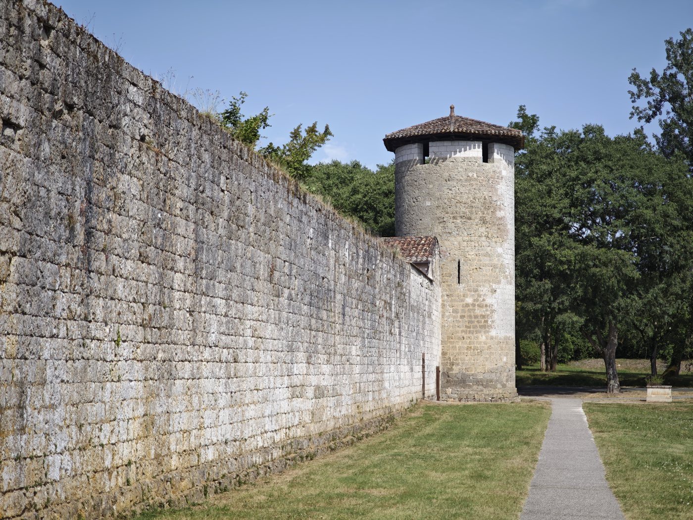The intact medieval walls and tower of the village of Vianne